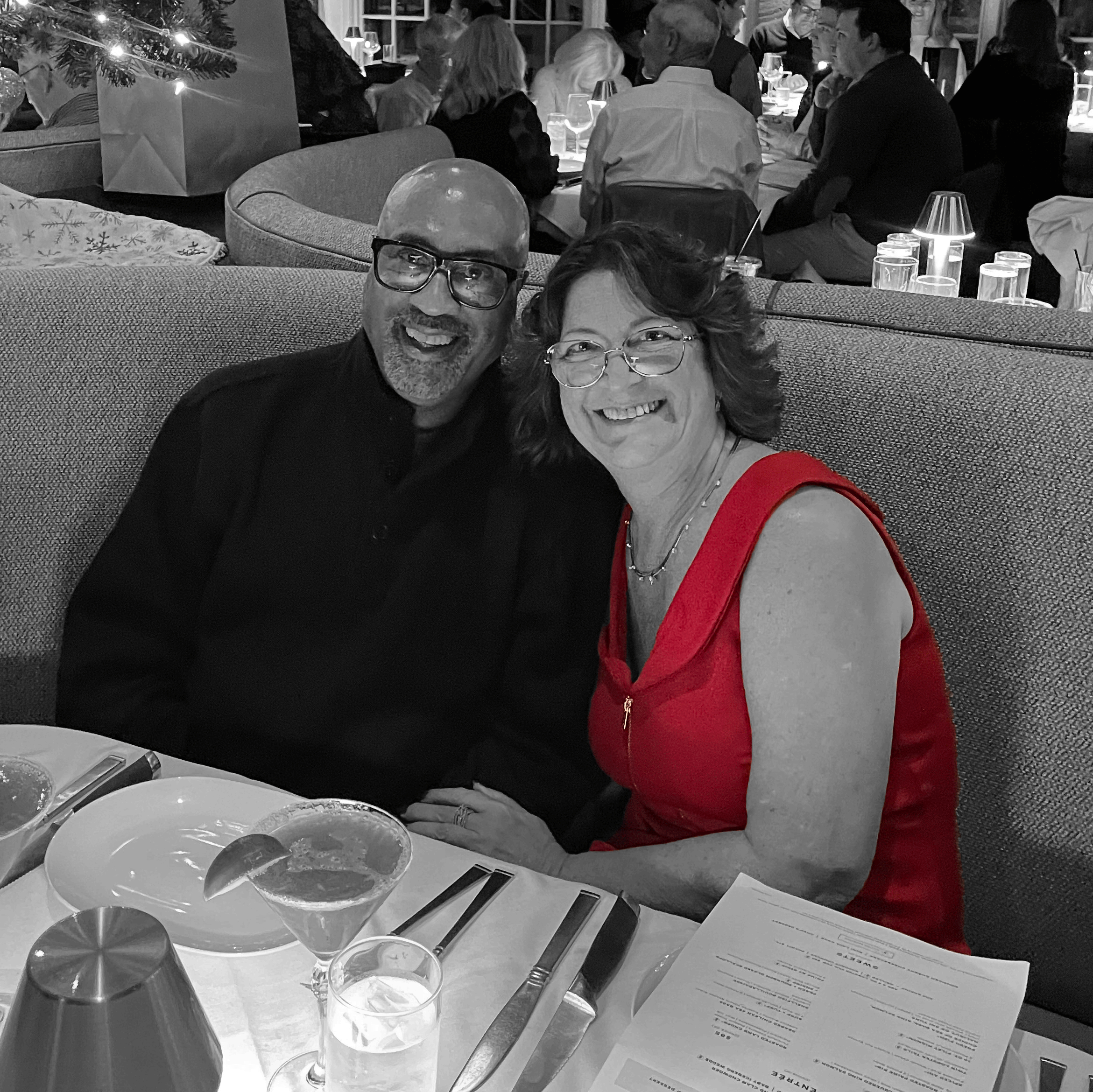 Sarina and Barry in a restaurant booth